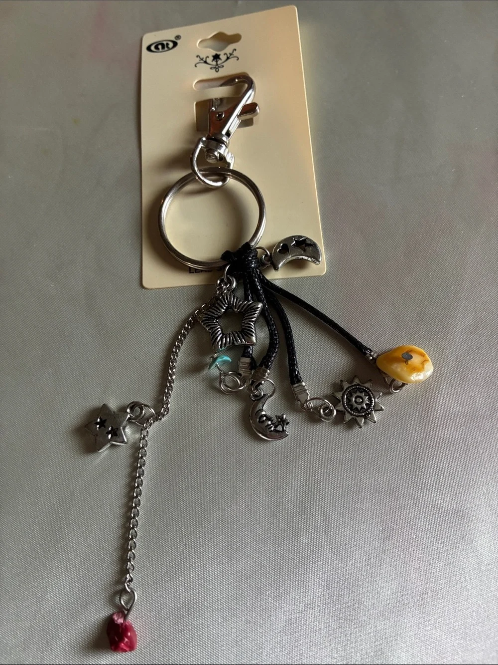 Silver Multi-Charm Star & Moon Keychain with Yellow Accent
